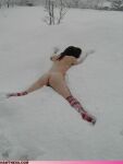 1girls ass breasts female mittens nude snow snow_angel socks tagme