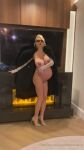 big_breasts blonde_hair fur_coat heels light-skinned_female pregnant solo sunglasses tagme webm