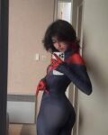 1girl ass breasts brown_hair clothed clothed_female cosplay female female_focus female_only female_solo looking_back medium_hair mirror mirror_selfie phone selfie small_breasts solo solo_female solo_focus spider-man_(series)