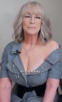 1girl actress big_breasts breasts celebrity chair cleavage female female_focus female_only female_solo gilf glasses jamie_lee curtis lipstick long_hair looking_at viewer makeup mature milf necklace sitting smile smiling solo text white_hair